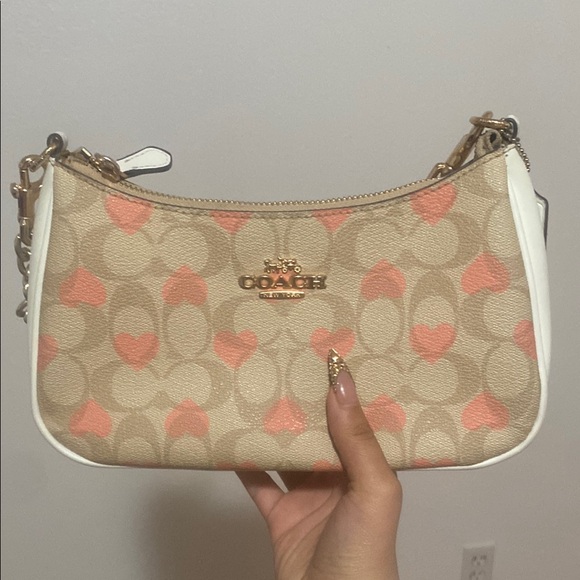 Coach Handbags - Coach Pink Heart Signature Canvas Mini Shoulder Bag
